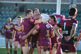 Shellharbour celebrate Brandon Webster-Mansfield's second try against Kiama on Sunday. Picture by Sylvia Liber