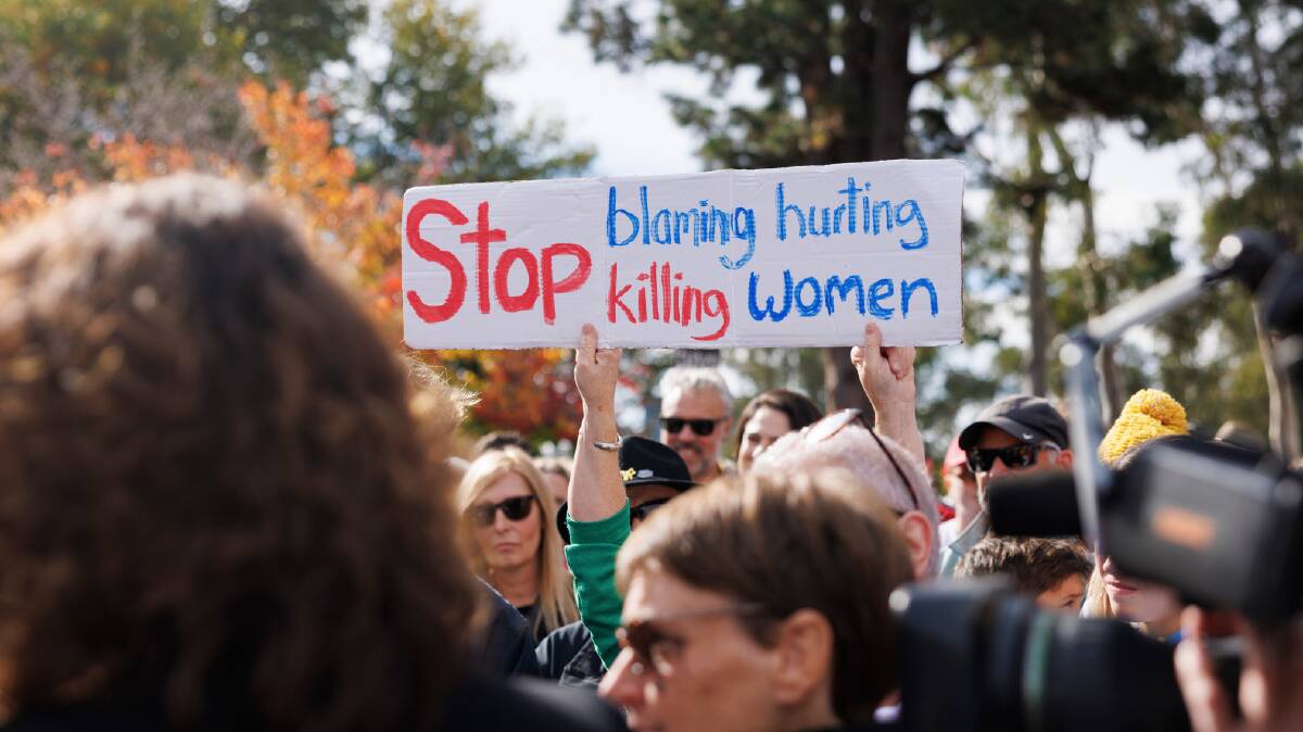 A sign held at a recent rally against gendered violence. Picture by Keegan Carroll
