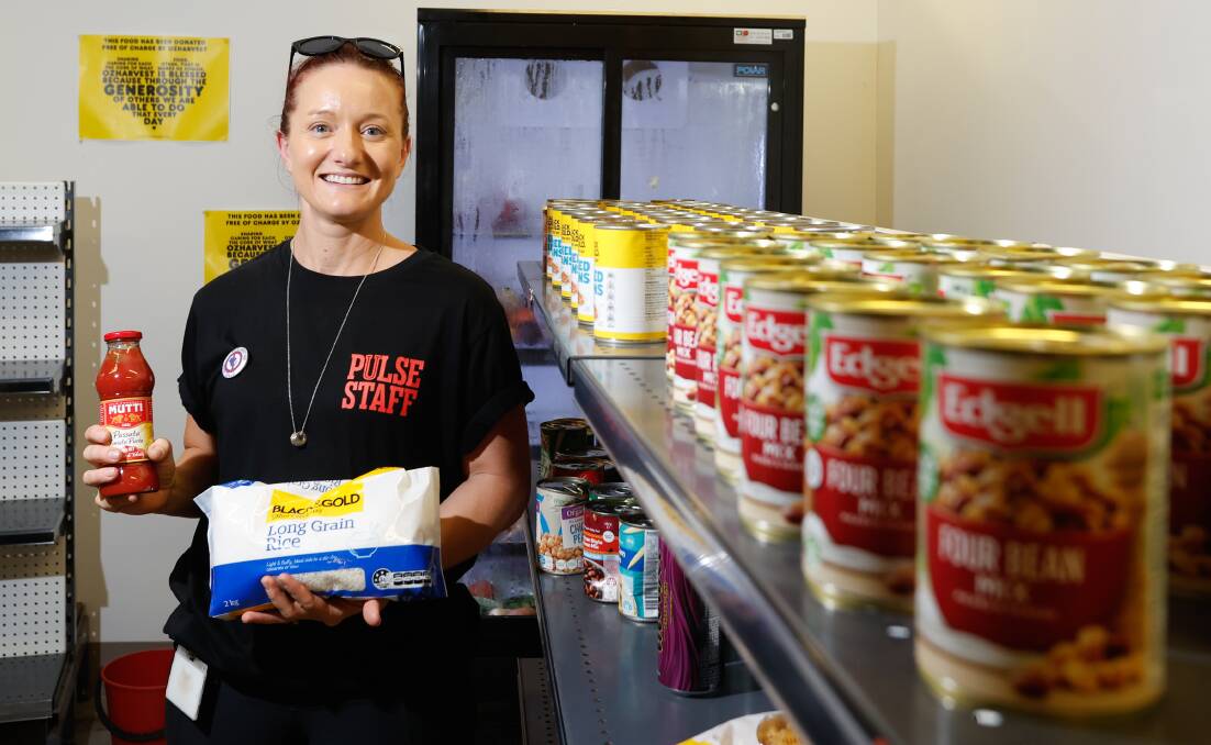 Head of student engagement and marketing at UOW Pulse, April Alexander holding some of the Pulse Pantry products. Picture by Anna Warr