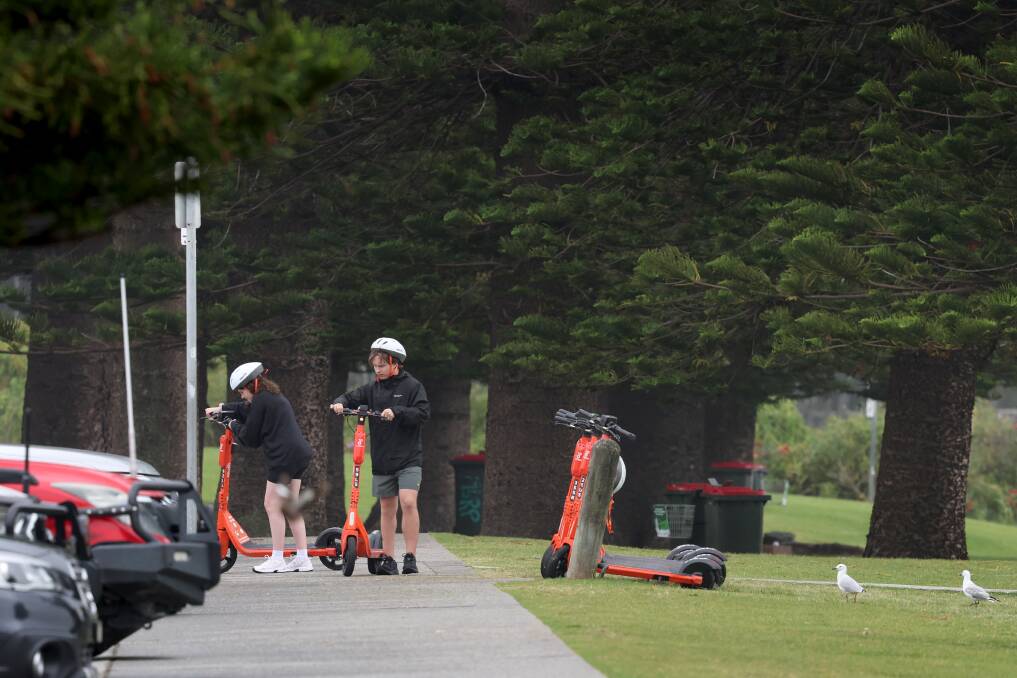 People riding e-scooters in North Wollongong on January 8, 2024. Picture by Sylvia Liber 