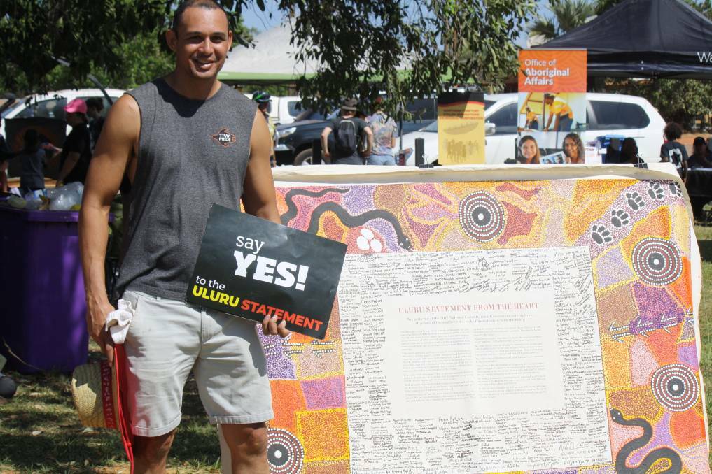 Thomas Mayor at the Northern Territory's Barunga Festival in 2018 with the Uluru Statement of the Heart, which calls for a constitutionally-enshrined First Nations Voice to Parliament. Picture: Roxanne Fitzgerald. 