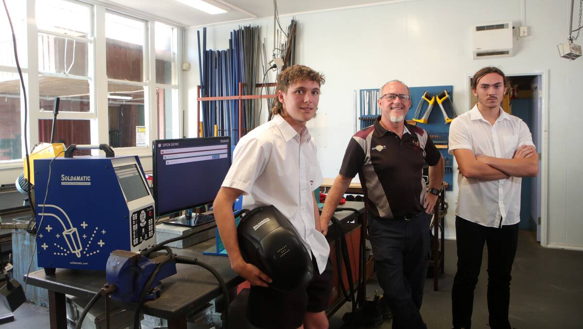 Riley McCann, Rik McCann and Charlie Fraser in the welding classroom. Picture by Sylvia Liber