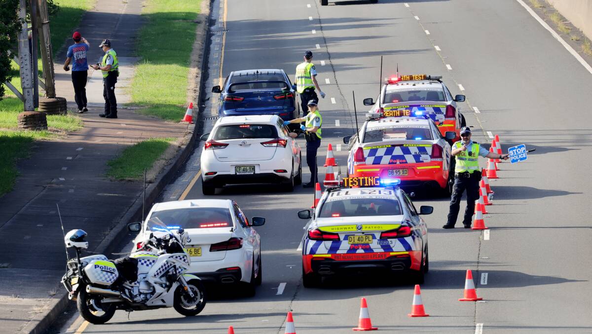 Police were out in force on Illawarra roads on Good Friday, including conducting breath testing on Five Islands Road in Cringila. Picture by Sylvia Liber