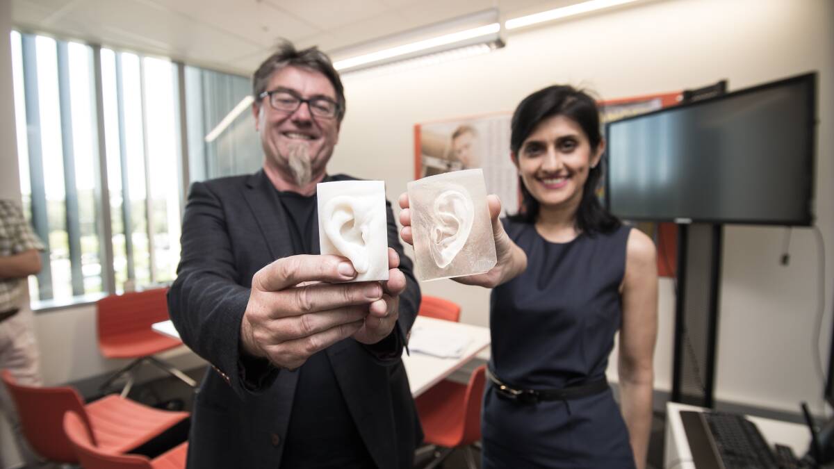 Gordon Wallace and Payal Mukherjee with their 3D printed ears. Picture: Supplied
