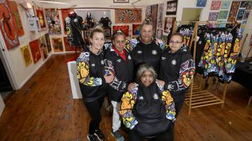 NAIDOC Week: From left, Michelle Wilson, Nicole Archibald, Allison Day, Kristy Thomas and, seated, Aunty Lorraine Brown. Picture: Sylvia Liber