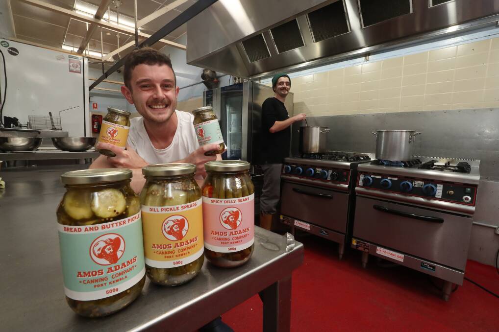Waste not: Brothers Braden (left) and Lachlan Kerr (right) and their products at Amos Adams Canning Company. Picture: Robert Peet