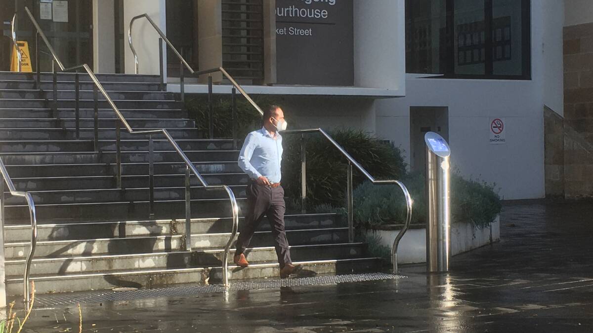 Fearful: Nilesh Mishra leaves Wollongong Courthouse after giving evidence in the trial into Libby Ruge's death. 