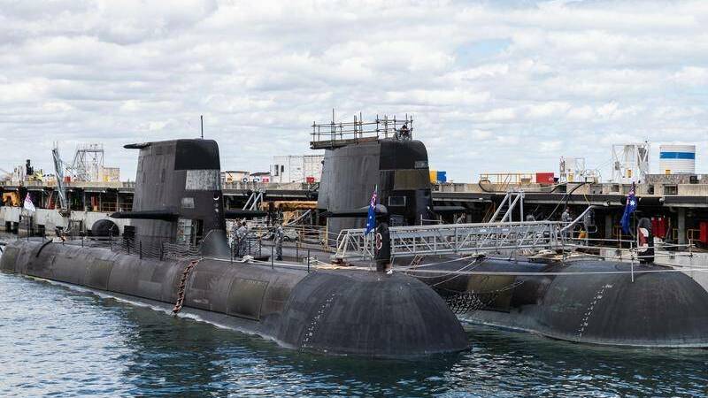 Defence officials are looking at Brisbane, Newcastle or Port Kembla for a new base for submarines.