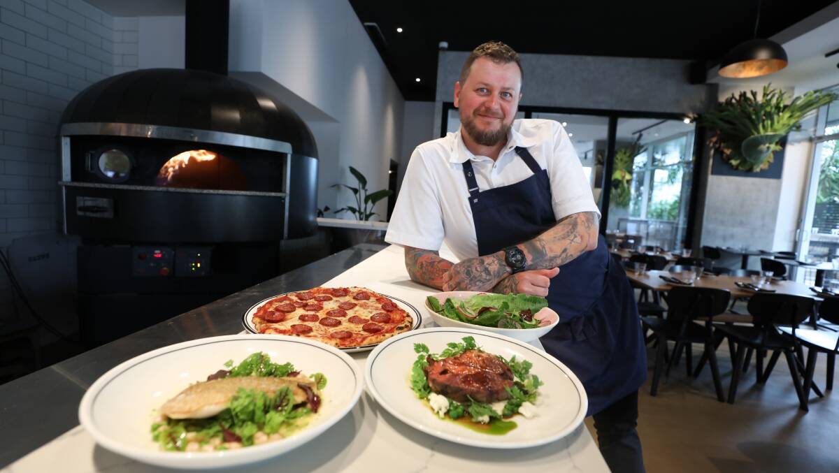 Kris Swiecinski with some of the dishes available at the recently opened Basta Trattoria at Hotel Totto. Picture by Adam McLean