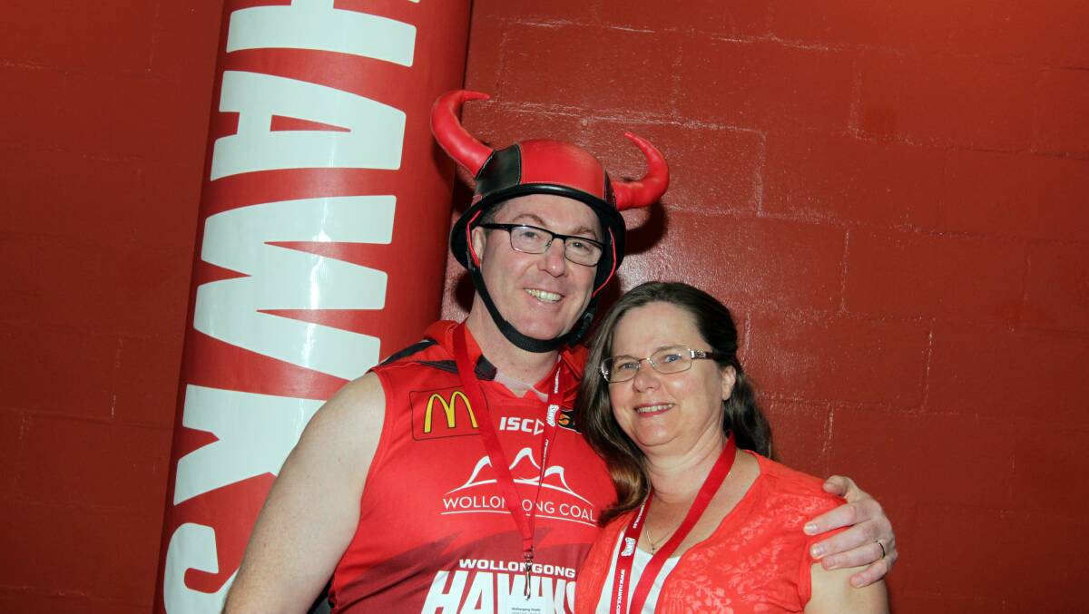 No. 1 fan: Graham Lancaster is a regular fixture at Illawarra Hawks home games, pictured here with wife Catherine Lancaster. Picture: Sylvia Liber