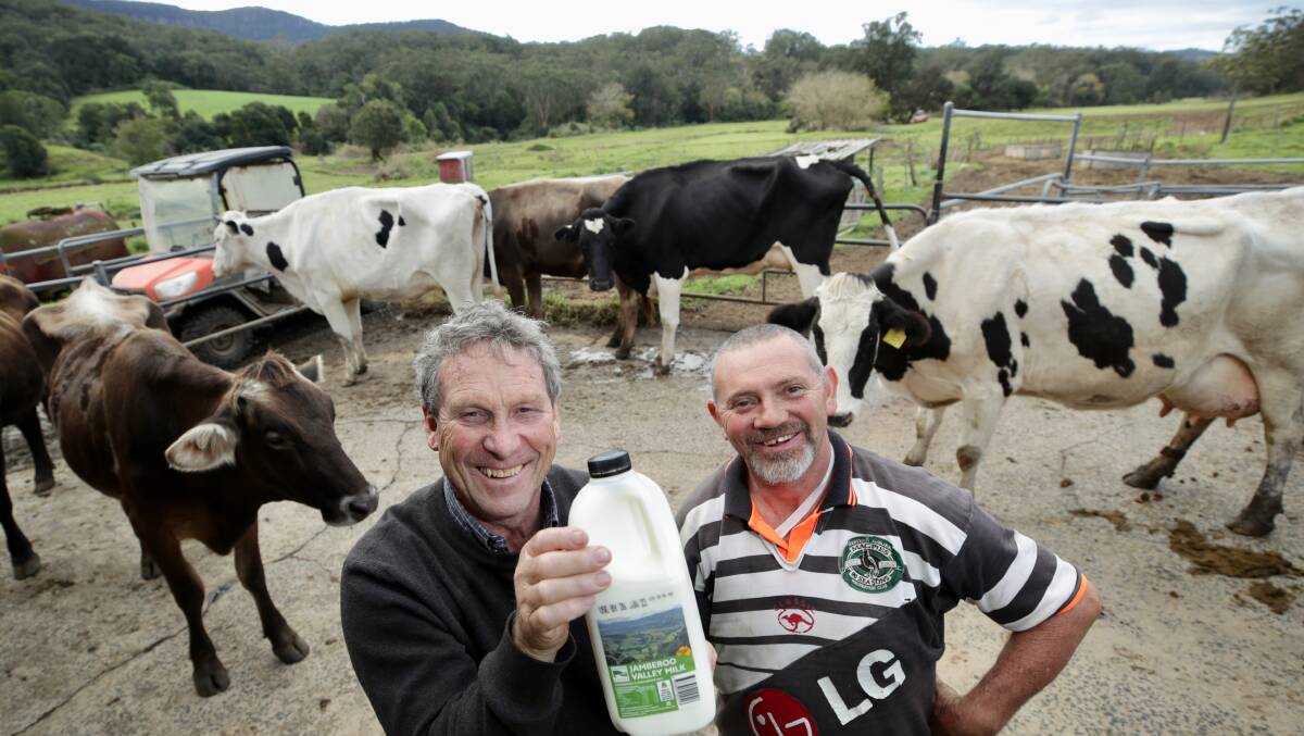 John Fairley with Jamberoo dairy farmer Ken Osborne when the local brand was launched last year. Picture by Adam McLean