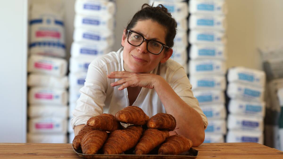 Emma Huber with some of her famous croissants. The business will continue baking in Bulli and selling their wares at Austinmer and Port Kembla as well. Picture by Robert Peet