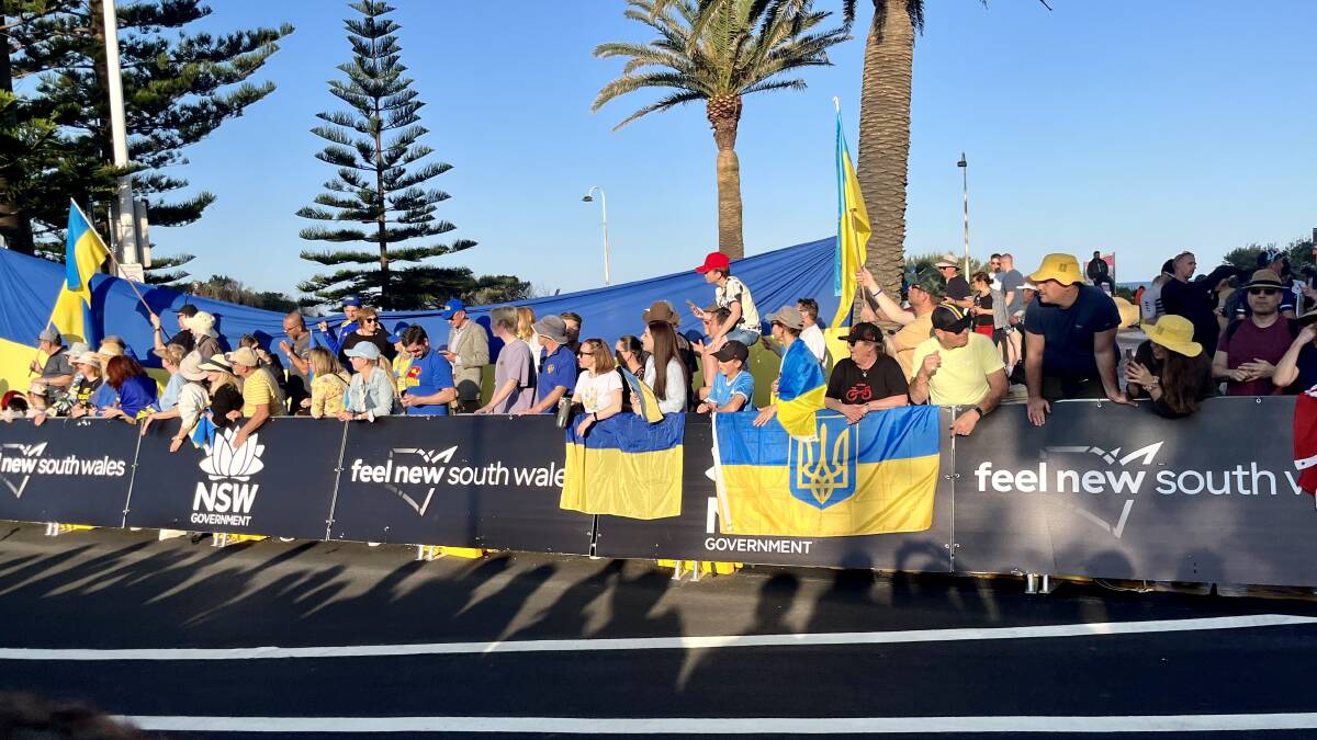 Supporters of the Ukrainian team cheer on the cyclists. Picture supplied