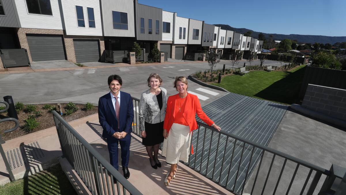 Award winning: Director of Traders in Purple Charlie Daoud, Housing Trust CEO Michele Adair and Housing Minister Melinda Pavey at last October's opening in Corrimal. Picture: Robert Peet