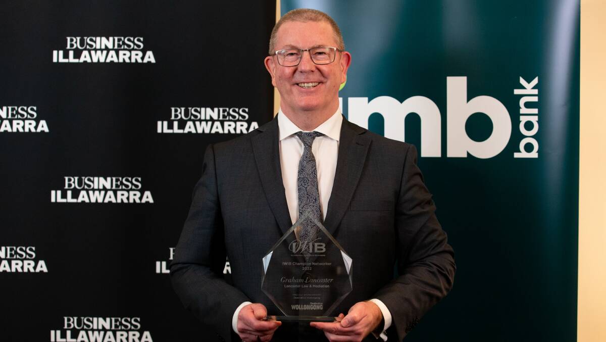 Connections: Graham Lancaster receives the award for Champion Networker at the 2022 Illawarra Women in Business Awards. Picture: Anna Warr