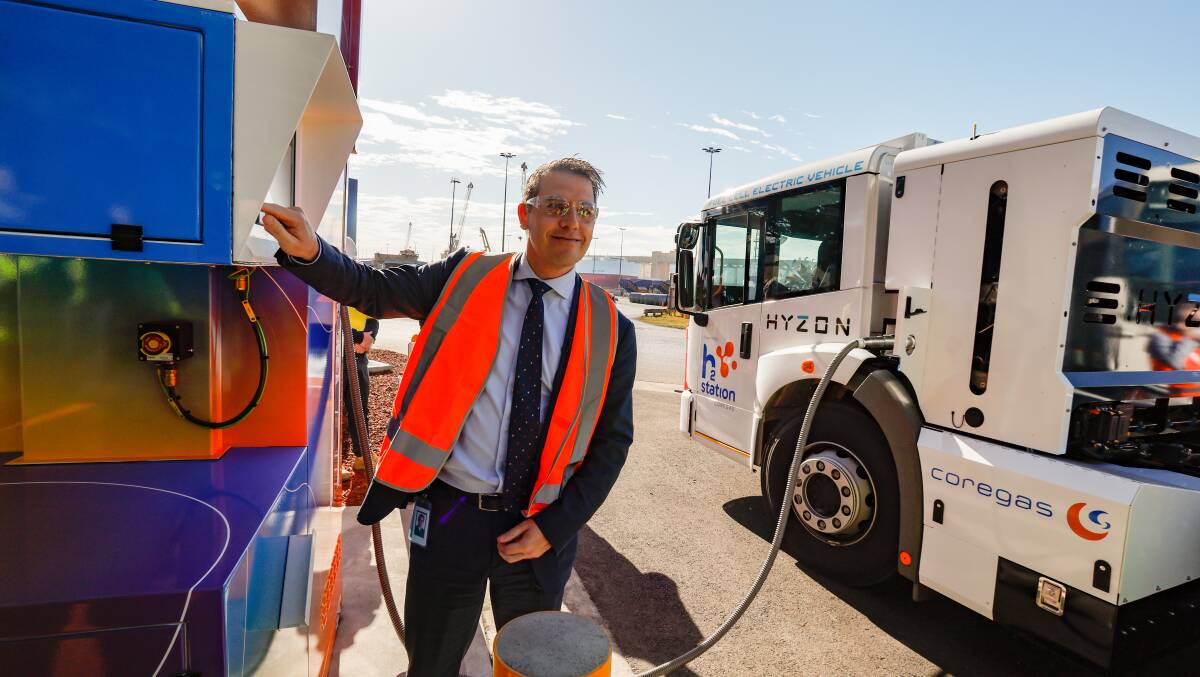 Minister for the Illawarra and South Coast Ryan Park fills up a hydrogen-powered truck in Port Kembla. Picture by Anna Warr