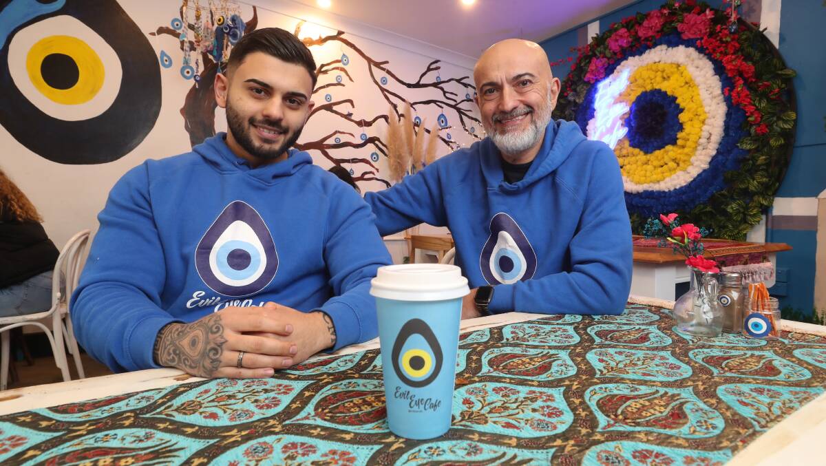 Concept cafe: Kayahan and Steve Gunes at the Fairy Meadow branch of the Evil Eye Cafe. Picture: Robert Peet