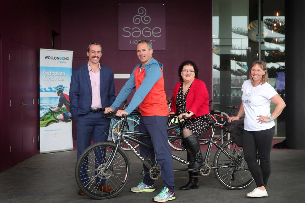 Bike businesses: From left, Mark Upton - Sage Hotel, Fred David - IgKnight and Cycle Tours NSW, Tania Brown - Destination Wollongong and Michelle Upton - South Coast Bike Hire. Picture: Sylvia Liber. 