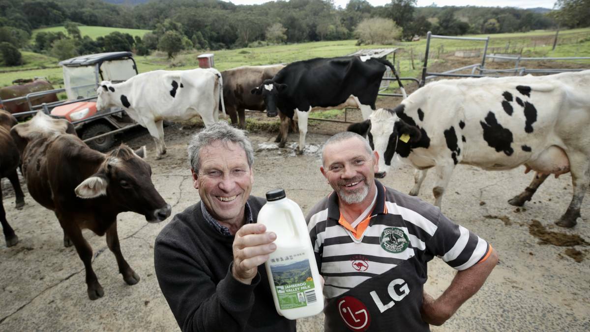 Processor John Fairley with farmer Ken Osborne when the Jamberoo milk brand launched last year. Picture: Adam McLean