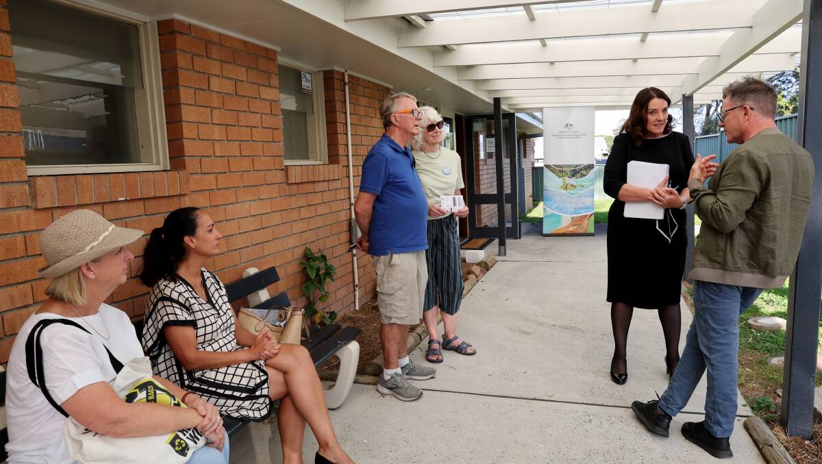 Cunningham MP Alison Byrnes (second from right) speaks to a constituent at the Bulli in-person consultation session. Picture by Sylvia Liber