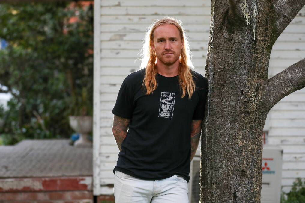 Tom Comerford outside his North Wollongong property that was inundated in the March 2022 floods. Picture by Adam McLean