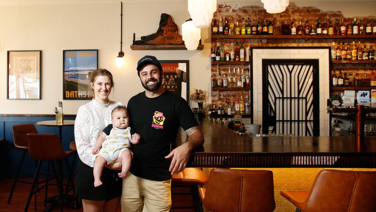 Justine Parkinson, Ben Abraham and baby Rowan at newly opened Port Kembla nightspot The Iron Yampi. Picture by Anna Warr