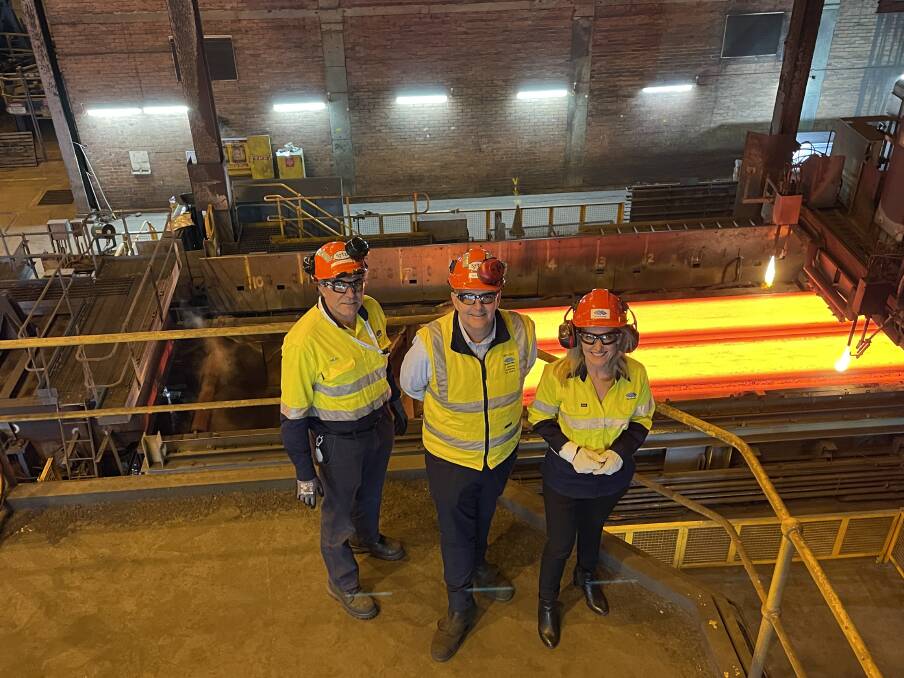 Steelworks: L-R Milco Stojanoski, BlueScope manager slabmaking, David Scott, general manager, manufacturing and NSW Minister for Metropolitan Roads Natalie Ward. Picture: Connor Pearce