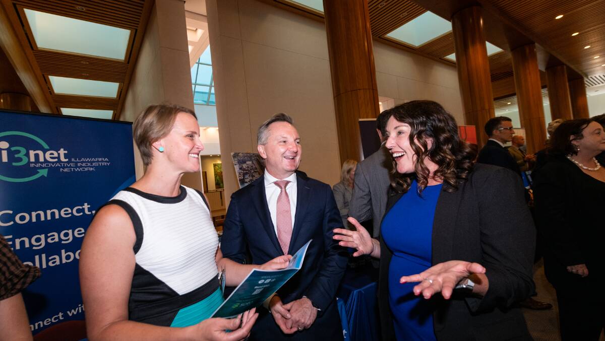 Federal climate change and energy minister Chris Bowen speaks with Cunningham MP Alison Byrnes and Robyn Johnson, CEO of Blend ESQ, at the Illawarra energy expo. Picture by Paul Chapman/supplied 