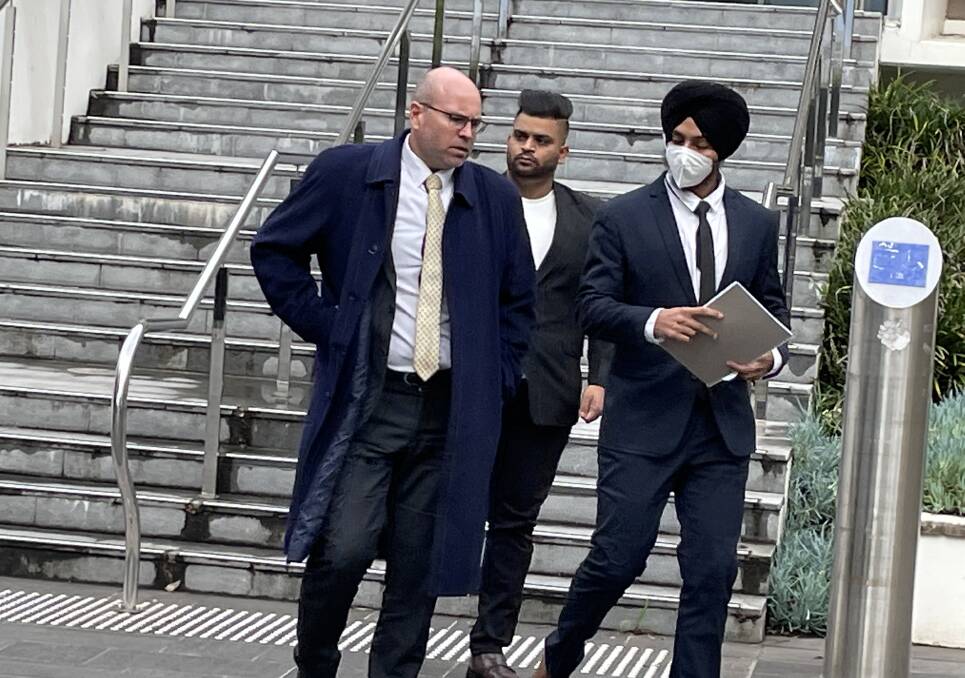 Trial continues: Jaskaran Singh (right) leaves Wollongong Courthouse on Tuesday. Picture: Connor Pearce