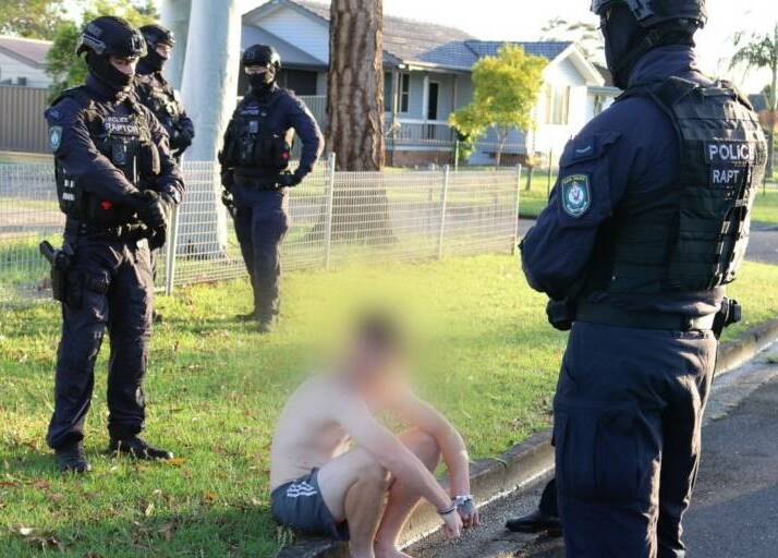 Josh Edwards outside the Warilla home where he was arrested on Wednesday morning. Picture NSW Police