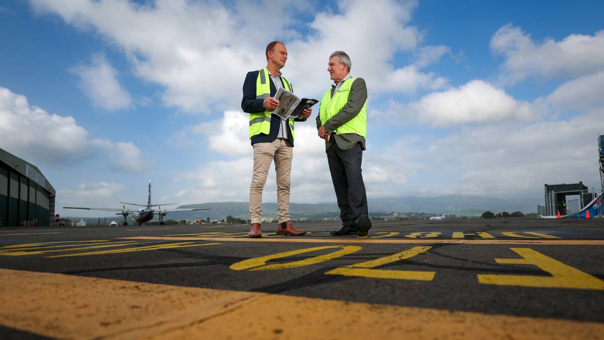 Shellharbour City Council mayor Chris Homer with council CEO Mike Archer at Shellharbour Airport. Picture by Adam McLean
