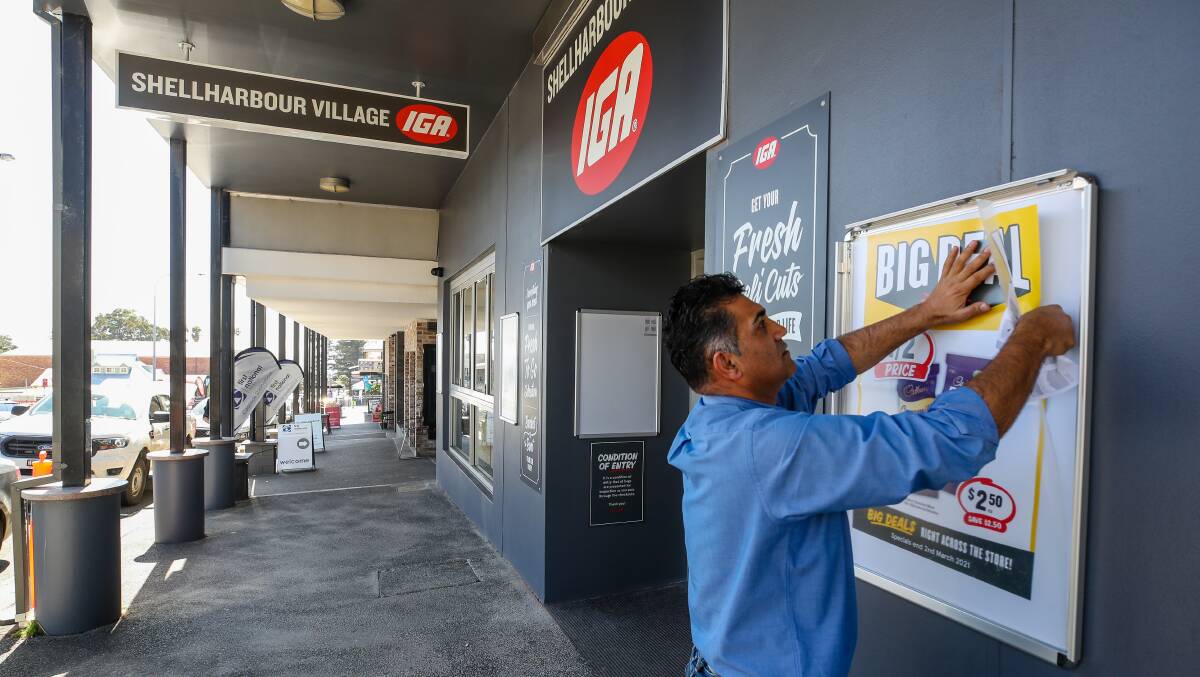 IGA owner Sam Alikozay has been adding the final touches to the new Shellharbour store in the lead up to opening. Picture: Adam McLean