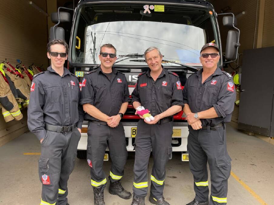 Adam Reeson, Stephen Edgar, Roberto Gnecchi-Ruscone and station officer Dennis Cornell went to a Bundanoon hotel to help a woman deliver her baby three weeks earlier than expected. Picture supplied 