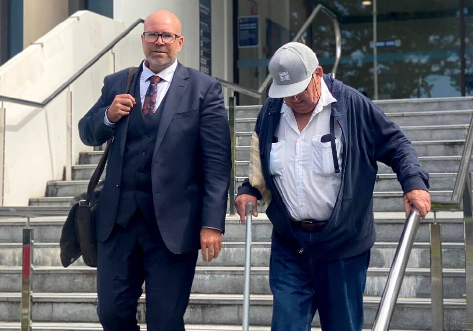 Kenneth MacDonald (right) leaving Wollongong courthouse alongside lawyer Patrick Schmidt after the first day of his trial on November 27. Picture by ACM