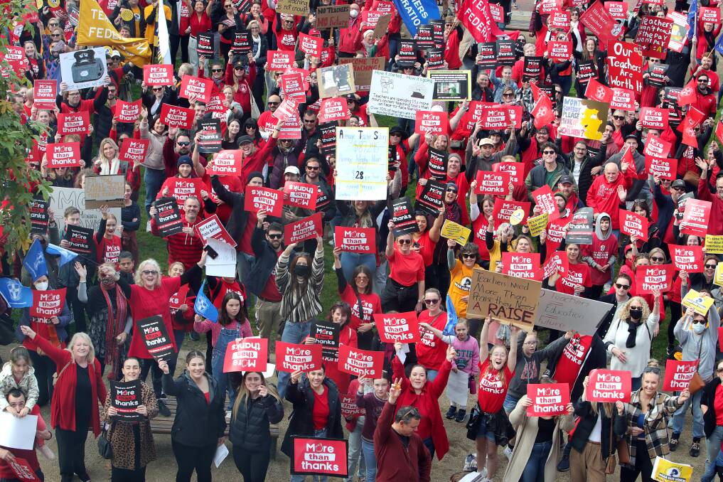 More than thanks, hear our voice: More than 2300 Illawarra teachers and their supporters marched through Burelli Street on Thursday. Picture: Sylvia Liber.