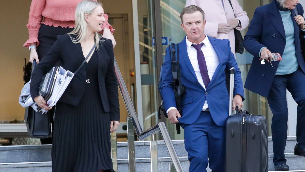 Phil Saunders leaving Wollongong courthouse in May. He has been placed on alternative duties as he fights allegations he ran a classroom betting club. Picture by ACM