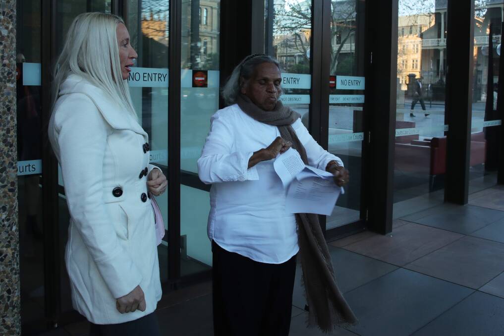 Aunty Jean Carter ripping up the judge's decision outside Sydney's Federal Court. Picture by Sylvia Liber