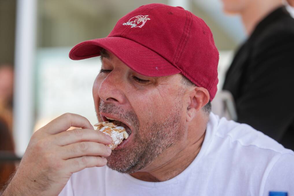 Mark Musumeci came second in the cannoli eating competition. Picture by Adam McLean.