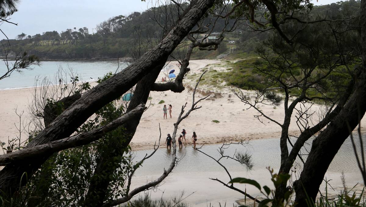 People playing in Mary Creek at Wreck Bay in January this year. Picture by Sylvia Liber.