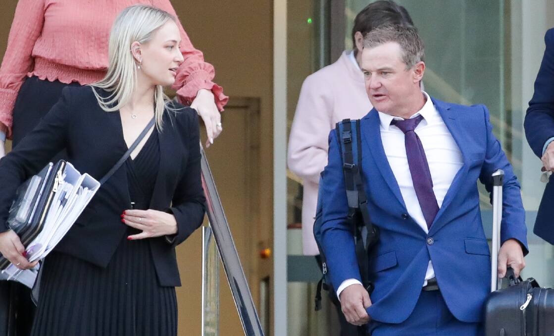 Phil Saunders (right) leaving Wollongong courthouse alongside his lawyer earlier this year. Picture by ACM