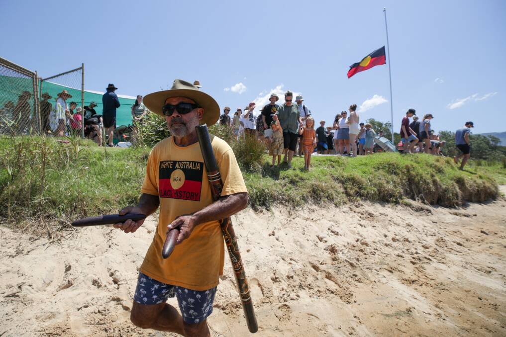 Uncle Peter Button leading the way to the smoking ceremony at the Kuradji Sandon Point Tent Embassy Survival Day event. Picture by Adam McLean. 