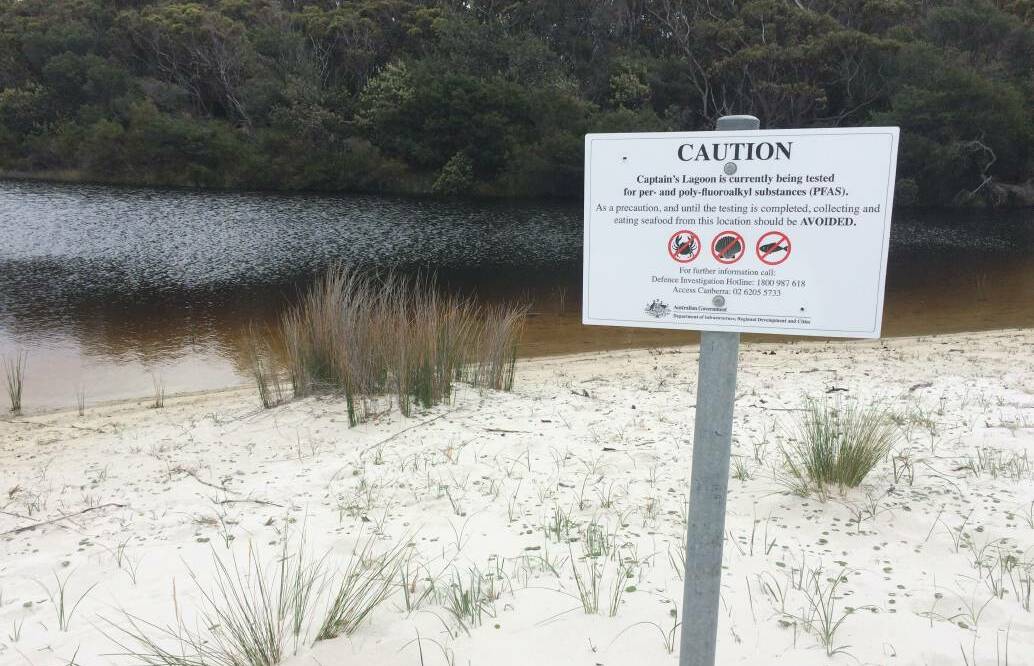 Signs warning of contamination in creeks and lagoons in Jervis Bay were erected after PFAS was identified. Picture supplied.
