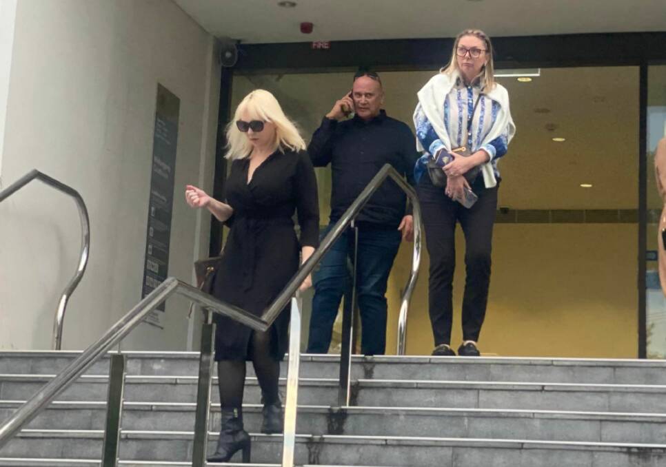Defence lawyer Zali Burrows leaving court with Bandidos Australia leader Tony Vartiainen. Picture by ACM.