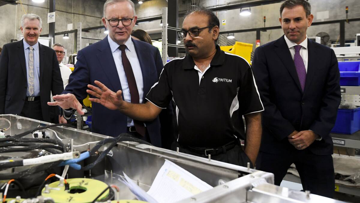 Labor leader Anthony Albanese touring a battery hub in Brisbane. Also pictured Jim Chalmers (right) and Tony Burke (left). Picture: AAP 