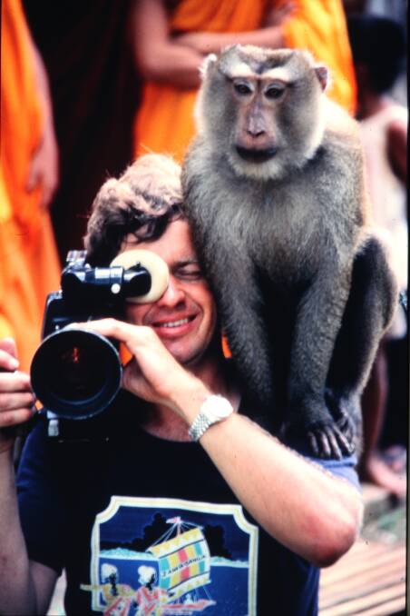 THERE'S A MONKEY ON MY BACK: Michael Dillon filming an adventure.