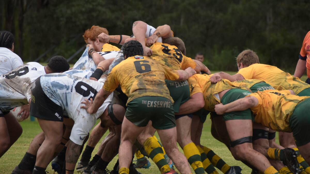 TOUGH-NOSED FOOTY: The Shoalies mid-scrum in an earlier season clash against Kiama. Picture: SAM BAKER
