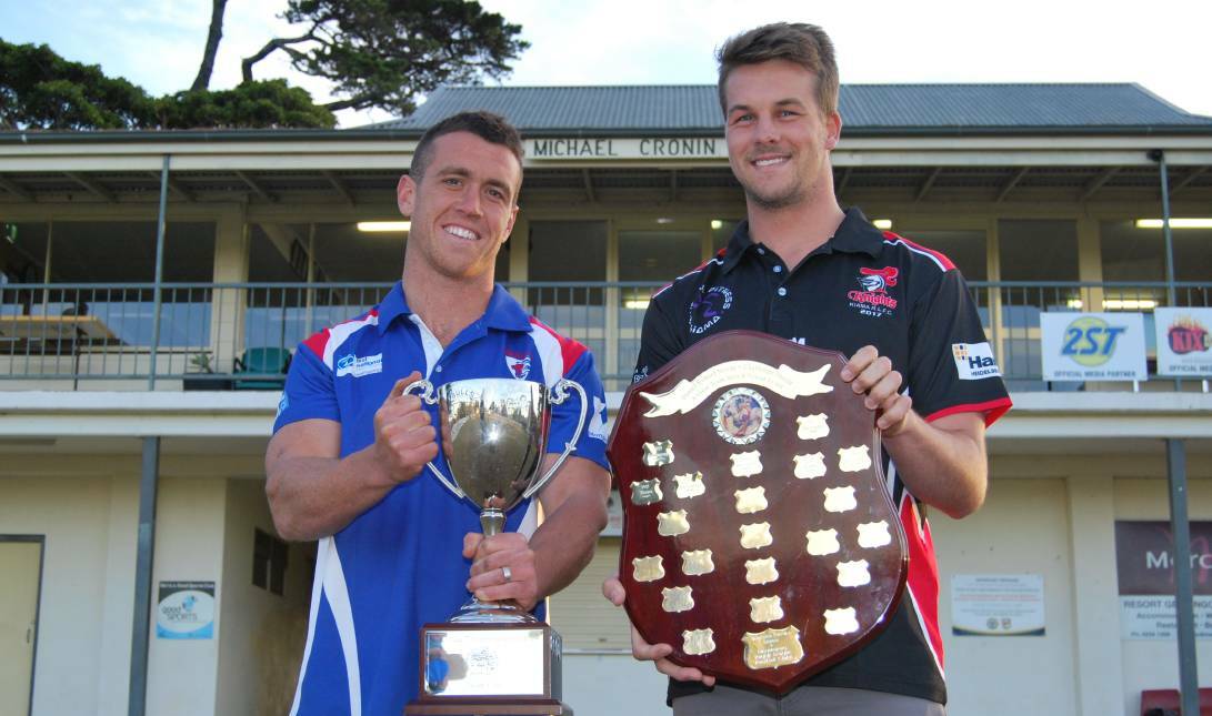 DERBY: Gerringong Lions' Rixon Russell and Kiama Knights' Kieran Poole holding up the hardware the sides compete for prior to their clash in 2017. Picture Hayley Warden