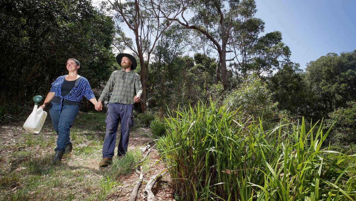 Love in the outdoors: Clementina Velasco, pictured, with Emmett Weatherford, has arranged a Bushcare for Singles event this month. Picture: Adam McLean.
