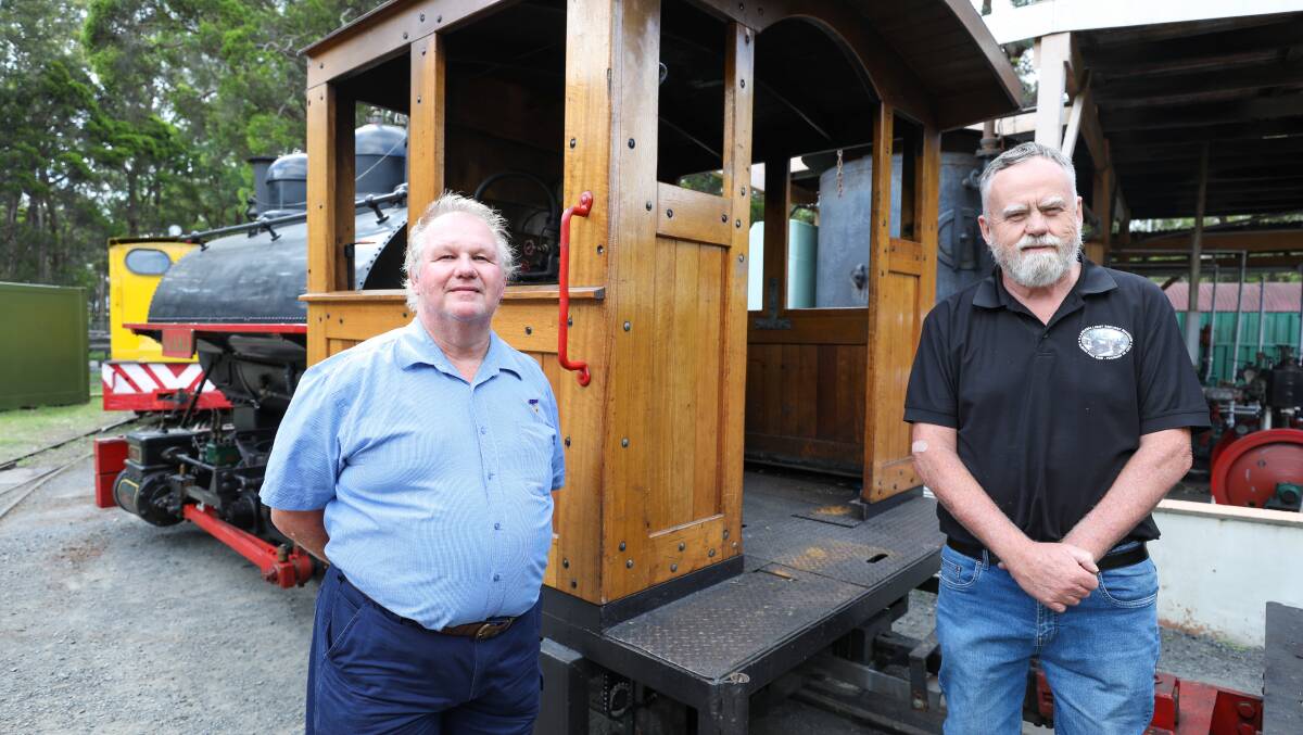Major milestone: Michael Milway and Brad Johns, pictured last year when the Illawarra Light Railway Museum Society turned 50, are celebrating a combined 81 years' service. Picture: Adam McLean 