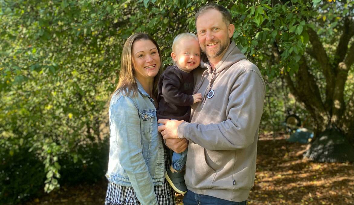 Family complete: Rachel McMinn and Michael Lewis with their 'miracle baby' Riley, 1.
Picture: Supplied
